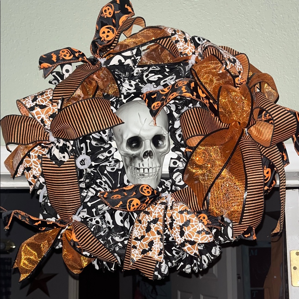 Beautiful homemade, full Halloween Skull Wreath with Orange and Black Ribbons